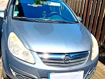 Używany Opel Corsa Selection 80 KM (58 kW) 2009 Srebrny Hatchback