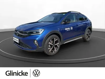 Gebraucht VW Taigo Style 150 PS (110 kW) 2024 Reef blue metallic / schwarz SUV