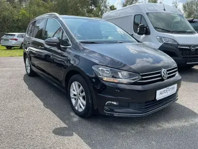 Second-hand VW Touran Highline 150 CP (110 kW) 2017 Negru Monovolum