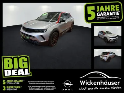 Gebraucht Opel Mokka GS Line 101 PS (74 kW) 2022 Kontrast grau/quarz silber SUV