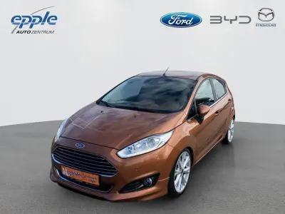 Gebraucht Ford Fiesta Individual 125 PS (91 kW) 2014 Castanobraun metallic Kleinwagen