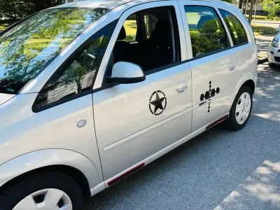 Gebraucht Opel Meriva 105 PS (77 kW) 2007 Silber Van / Kleinbus