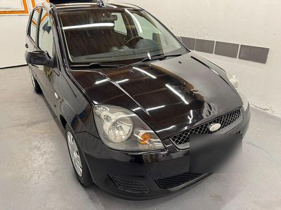 Second-hand Ford Fiesta 60 CP (44 kW) 2006 Negru Hatchback