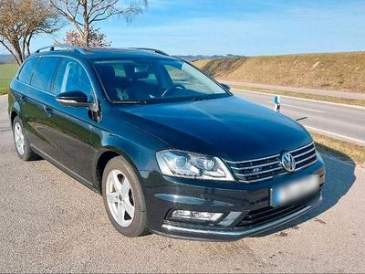 Second-hand VW Passat R-line 140 CP (102 kW) 2013 Negru Break