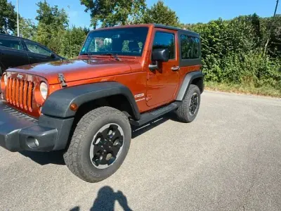 Gebraucht Jeep Wrangler Unlimited Sport 200 PS (147 kW) 2014 Orange SUV