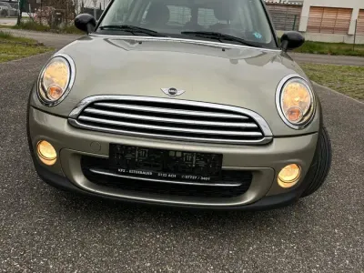 Używany Mini Cooper 116 KM (85 kW) 2010 Złoty Hatchback