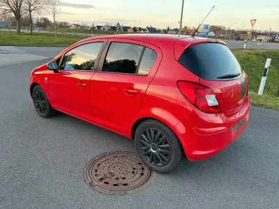 Używany Opel Corsa Edition 69 KM (50 kW) 2010 Czerwony Hatchback