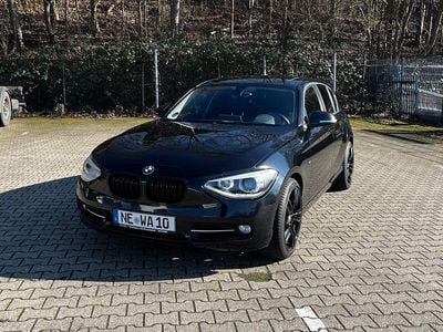 Gebraucht BMW 118 Sport Line 170 PS (125 kW) 2011 Schwarz Kleinwagen