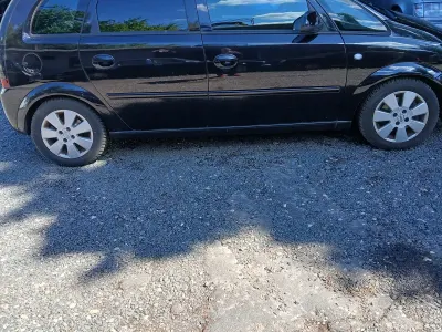Gebraucht Opel Meriva 101 PS (74 kW) 2007 Schwarz Van / Kleinbus