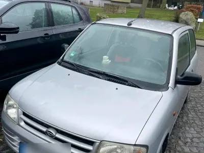 Gebraucht Daihatsu Cuore 56 PS (41 kW) 1999 Silber Kleinwagen