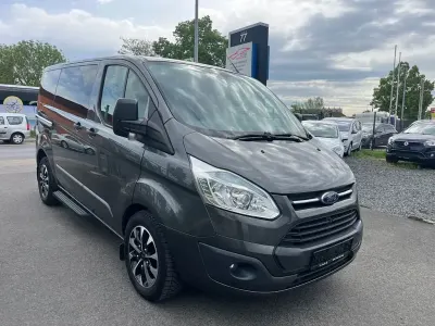 Occasion Ford Transit Custom 125 ch (91 kW) 2015 Gris Monospace