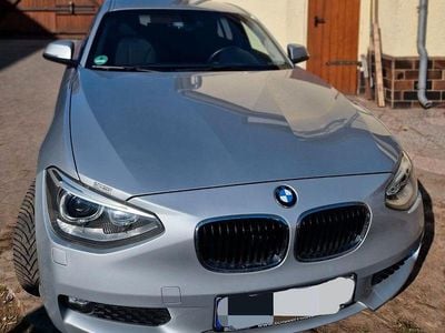 Second-hand BMW 118 143 CP (105 kW) 2012 Argintiu Hatchback