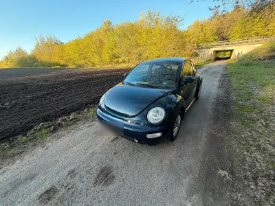 Second-hand VW New Beetle 90 CP (66 kW) 2000 Albastru Hatchback