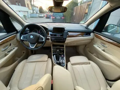 Gebraucht BMW 218 Active Tourer Luxury Line 150 PS (110 kW) 2014 Grau Van / Kleinbus