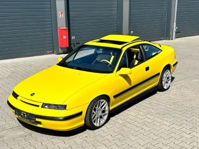 Używany Opel Calibra 116 KM (85 kW) 1993 Żółty Coupe