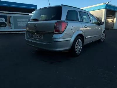 Używany Opel Astra 90 KM (66 kW) 2005 Szary Kombi