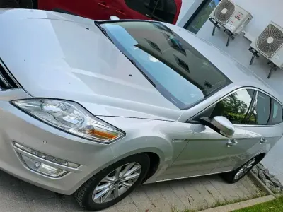 Gebraucht Ford Mondeo 163 PS (119 kW) 2011 Silber Kombi