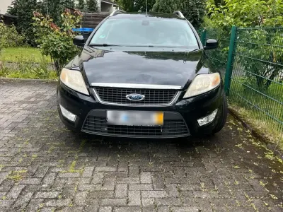 Używany Ford Mondeo 140 KM (102 kW) 2008 Czarny Kombi