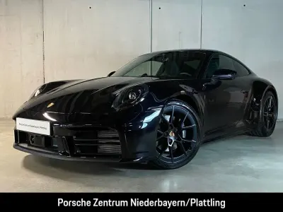 Neu Porsche 911 Carrera 394 PS (289 kW) 2026 Tiefschwarzmetallic Coupé
