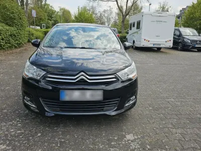 Używany Citroën C4 Tendance 120 KM (88 kW) 2013 Czarny Sedan/Limuzyna