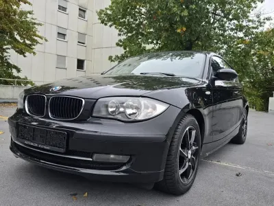 Gebraucht BMW 116 121 PS (88 kW) 2009 Schwarz Kleinwagen