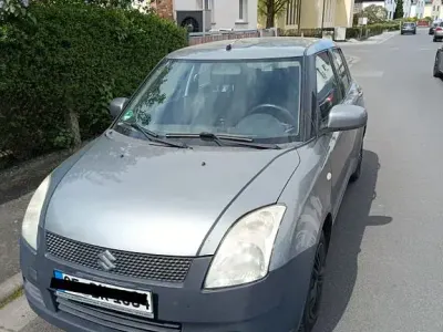 Używany Suzuki Swift 92 KM (67 kW) 2005 Szary Hatchback
