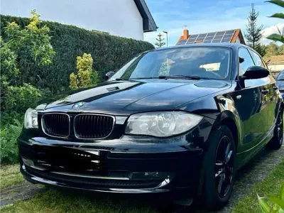 Gebraucht BMW 116 122 PS (89 kW) 2009 Schwarz Kleinwagen