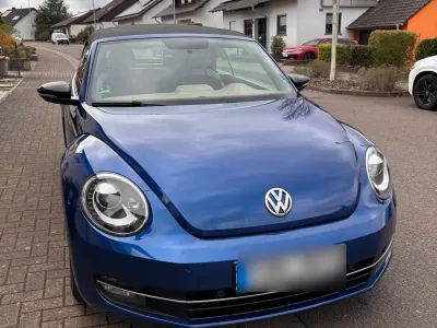 Używany VW Beetle Sport 140 KM (102 kW) 2014 Niebieski Hatchback