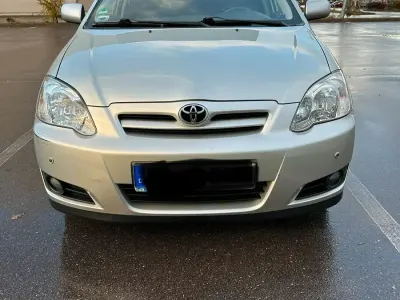 Używany Toyota Corolla 115 KM (84 kW) 2005 Srebrny Sedan/Limuzyna