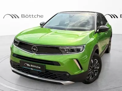 Gebraucht Opel Mokka Ultimate 131 PS (96 kW) 2022 Matcha green/ikone gruen SUV
