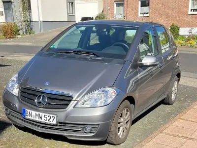 Używany Mercedes A180 116 KM (85 kW) 2012 Szary Minivan