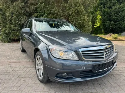 Używany Mercedes C200 136 KM (100 kW) 2010 Szary Kombi