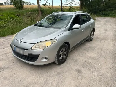 Gebraucht Renault Mégane GrandTour 106 PS (77 kW) 2010 Silber Kombi