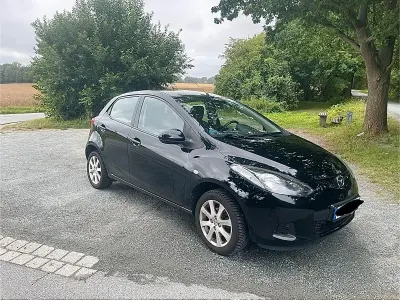 Gebraucht Mazda 2 75 PS (55 kW) 2009 Schwarz Kleinwagen