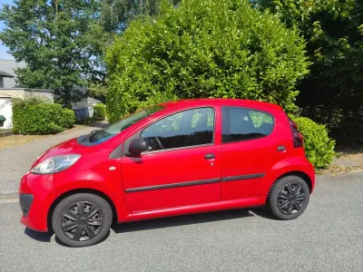 Gebraucht Peugeot 107 Access 68 PS (50 kW) 2013 Rot Kleinwagen
