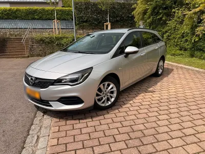 Używany Opel Astra 105 KM (77 kW) 2020 Srebrny Kombi