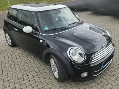Gebraucht Mini Cooper D 111 PS (81 kW) 2011 Schwarz Kleinwagen