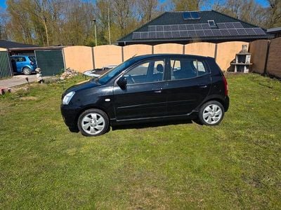 Second-hand Kia Picanto EX 65 CP (47 kW) 2006 Portocaliu Hatchback