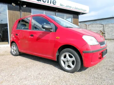 Gebraucht Daihatsu Cuore Plus 58 PS (42 kW) 2005 Rot Kleinwagen