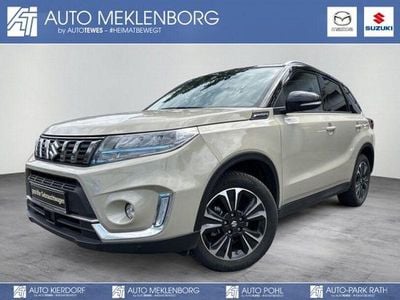 Gebraucht Suzuki Vitara Comfort+ 102 PS (75 kW) 2024 Savannah/ cosmic black pearl met SUV