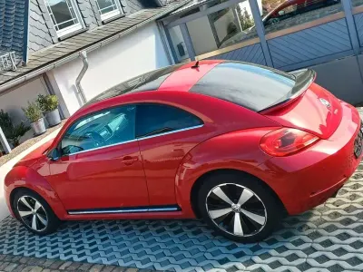 Używany VW Beetle Sport 200 KM (147 kW) 2013 Czerwony Hatchback
