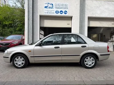 Second-hand Mazda 323 88 CP (64 kW) 1999 Gri Berlinǎ