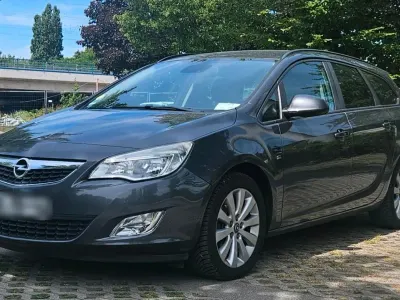 Gebraucht Opel Astra 125 PS (91 kW) 2012 Grau Kombi
