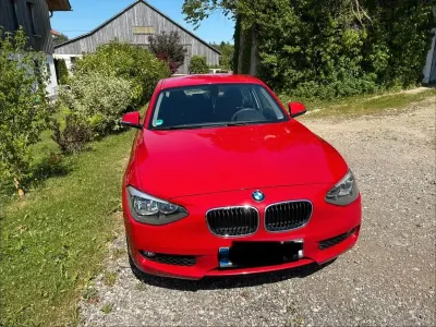 Gebraucht BMW 116 Sport Line 136 PS (100 kW) 2011 Rot Kleinwagen