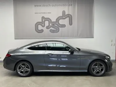 Gebraucht Mercedes C180 AMG 156 PS (114 kW) 2020 Selenitgrau  metalliclack Coupé