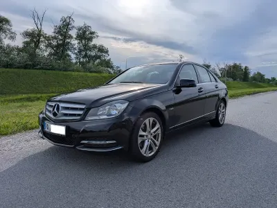 Używany Mercedes C180 Avantgarde 156 KM (114 kW) 2012 Czarny Sedan/Limuzyna