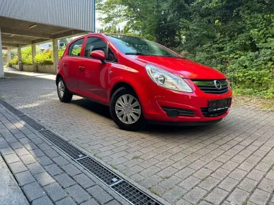 Gebraucht Opel Corsa Edition 80 PS (58 kW) 2009 Magma rot (b) Kleinwagen