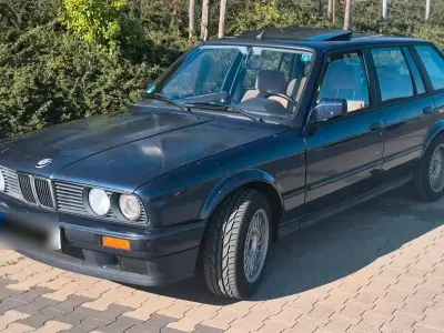 Gebraucht BMW 320 129 PS (94 kW) 1988 Blau Kombi