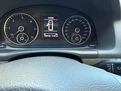 Second-hand VW Touran Match 140 CP (102 kW) 2012 Gri Monovolum