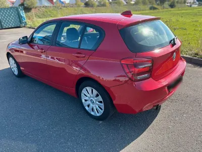 Gebraucht BMW 114 102 PS (75 kW) 2013 Rot Kleinwagen